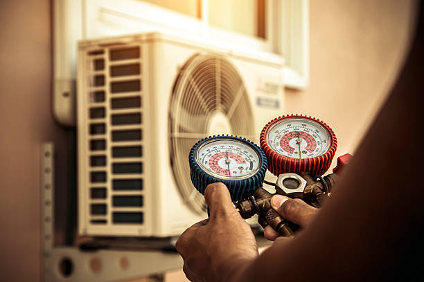 Professional Air Conditioning Service technician working in Maple Valley, WA